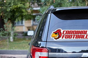 Custom car sticker Rear car window sticker with a cardinal bird graphic and text that reads Cardinal Football.